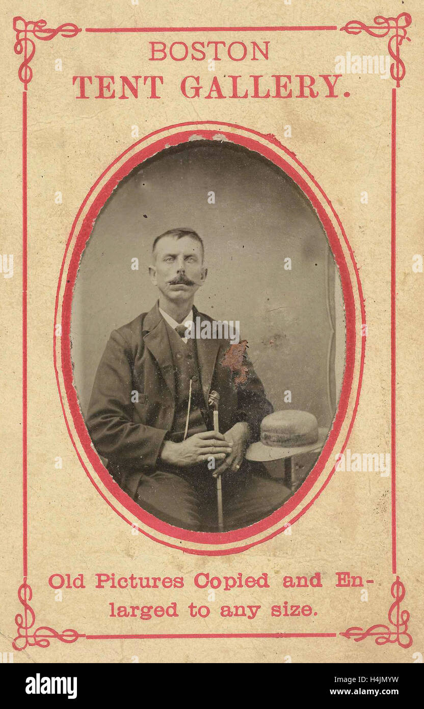 Portrait d'un homme avec chapeau et canne à sucre, tente Boston Galerie, c. 1870 - c. 1900 Banque D'Images