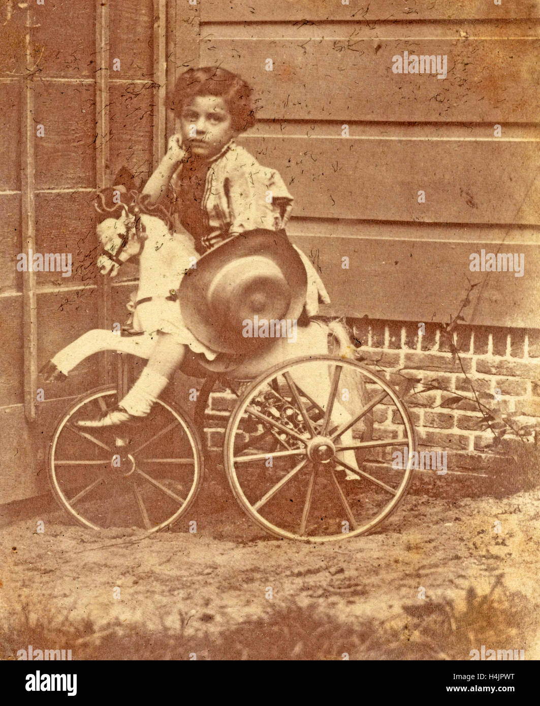 Louis Asser, fils du photographe, sur un tricycle, Eduard Isaac Asser, 1853 Banque D'Images