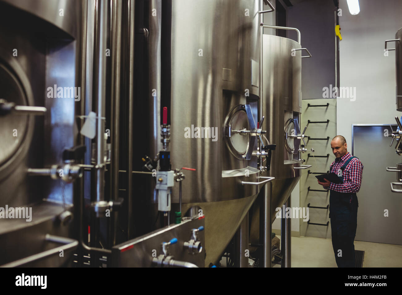 Machines à l'examen du propriétaire Banque D'Images