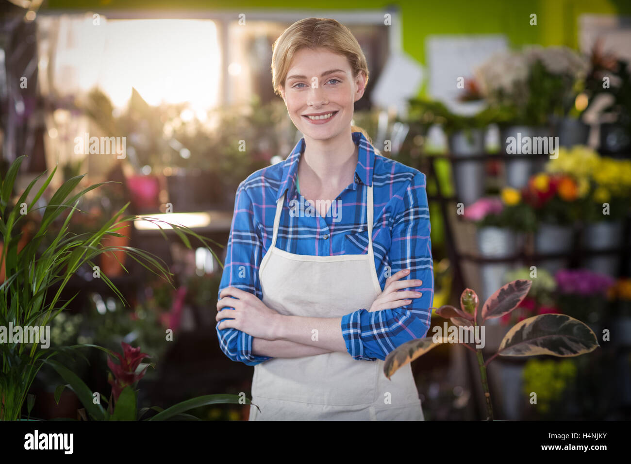 Portrait of female florist smiling Banque D'Images Portrait of female florist smiling Banque D'Images