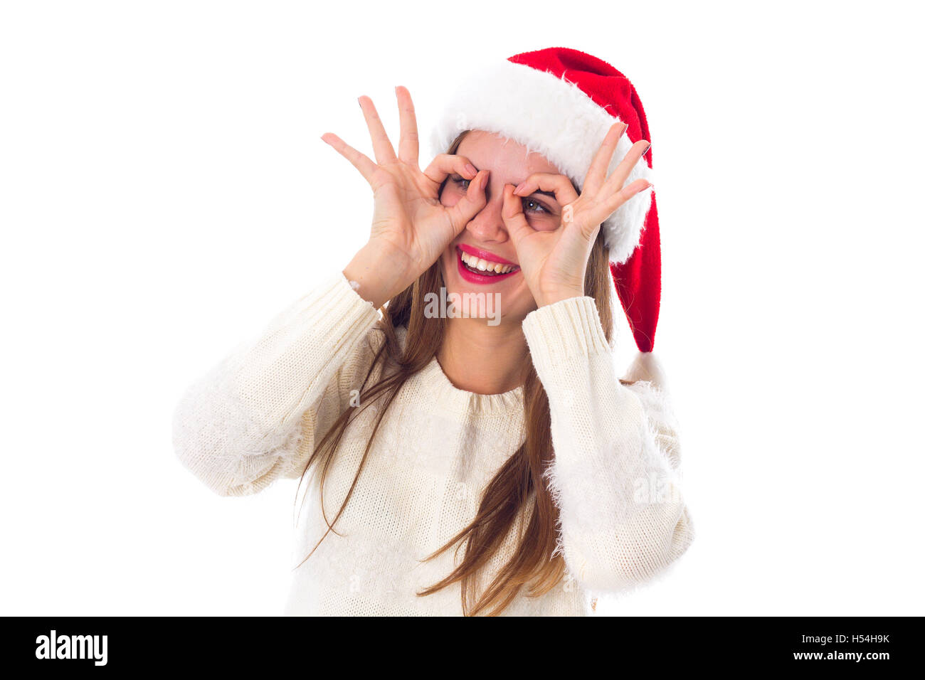 Woman in red christmas hat Banque D'Images