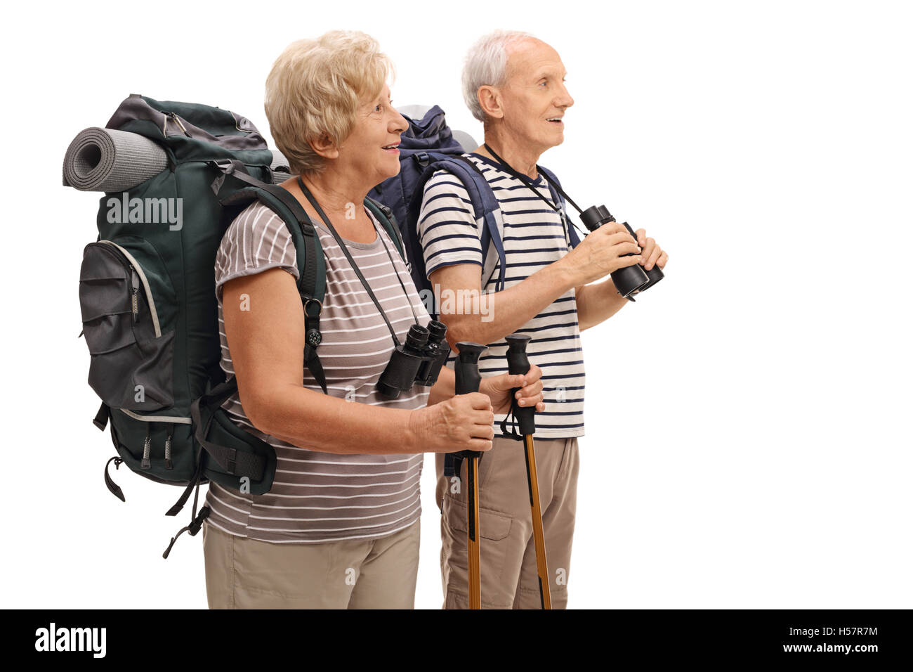 Les randonneurs regardant au loin isolé sur fond blanc Banque D'Images