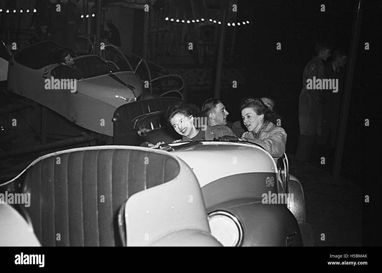 [Une fraction de seconde photo flash haute vitesse à la foire de l'Oswestry 'Whip tourbillonnante, 1948] Banque D'Images