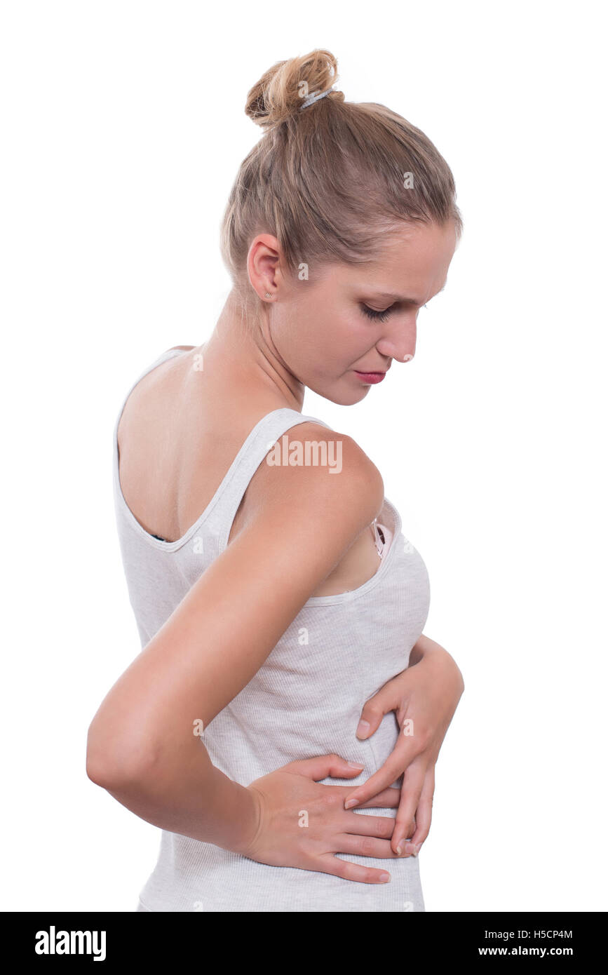 Les jeunes femmes de toucher le côté droit du corps dans la douleur. La douleur rénale. Isolé