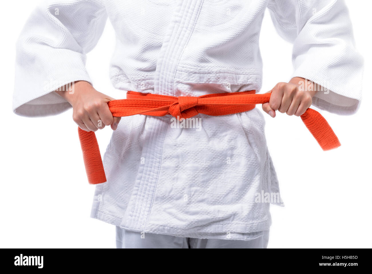 Les mains de l'athlète, le Judo, l'attacher une ceinture autour du corps  Photo Stock - Alamy