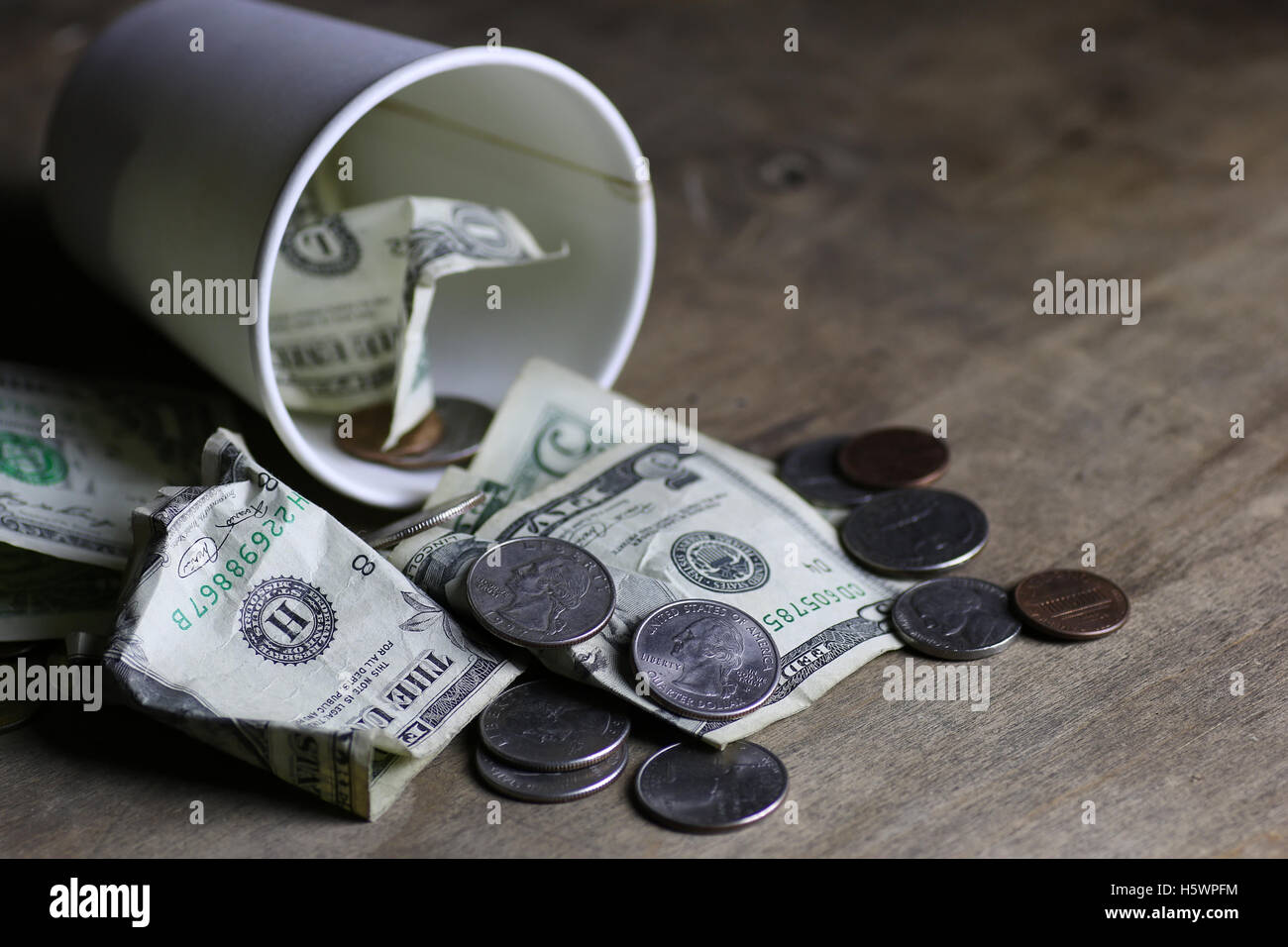 L'argent de pièce de mendicité Banque D'Images