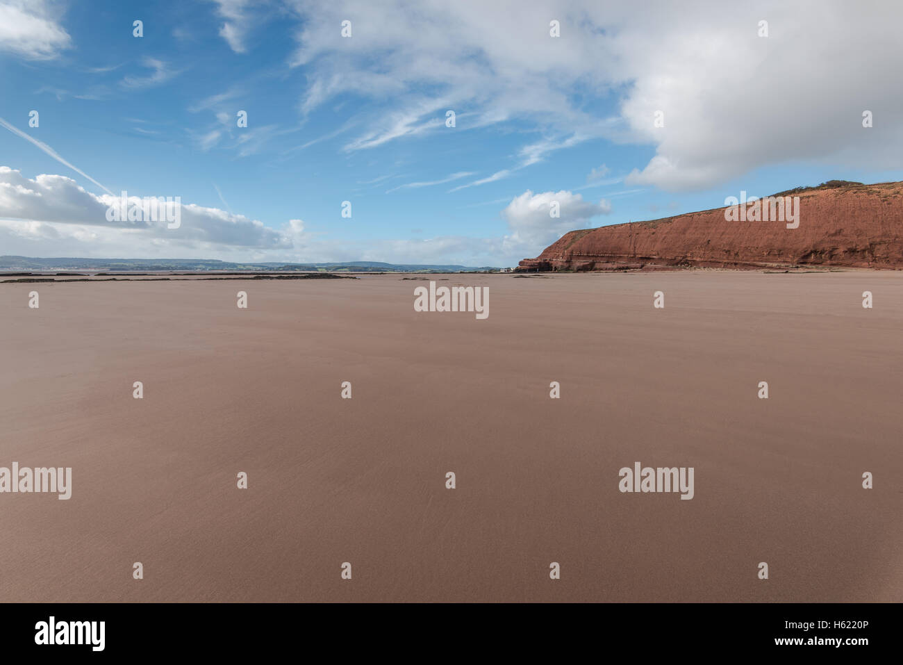 Plage de sable avec du sable rouge en Exmouth, Devon, UK. La Côte Jurassique, site du patrimoine mondial. Banque D'Images