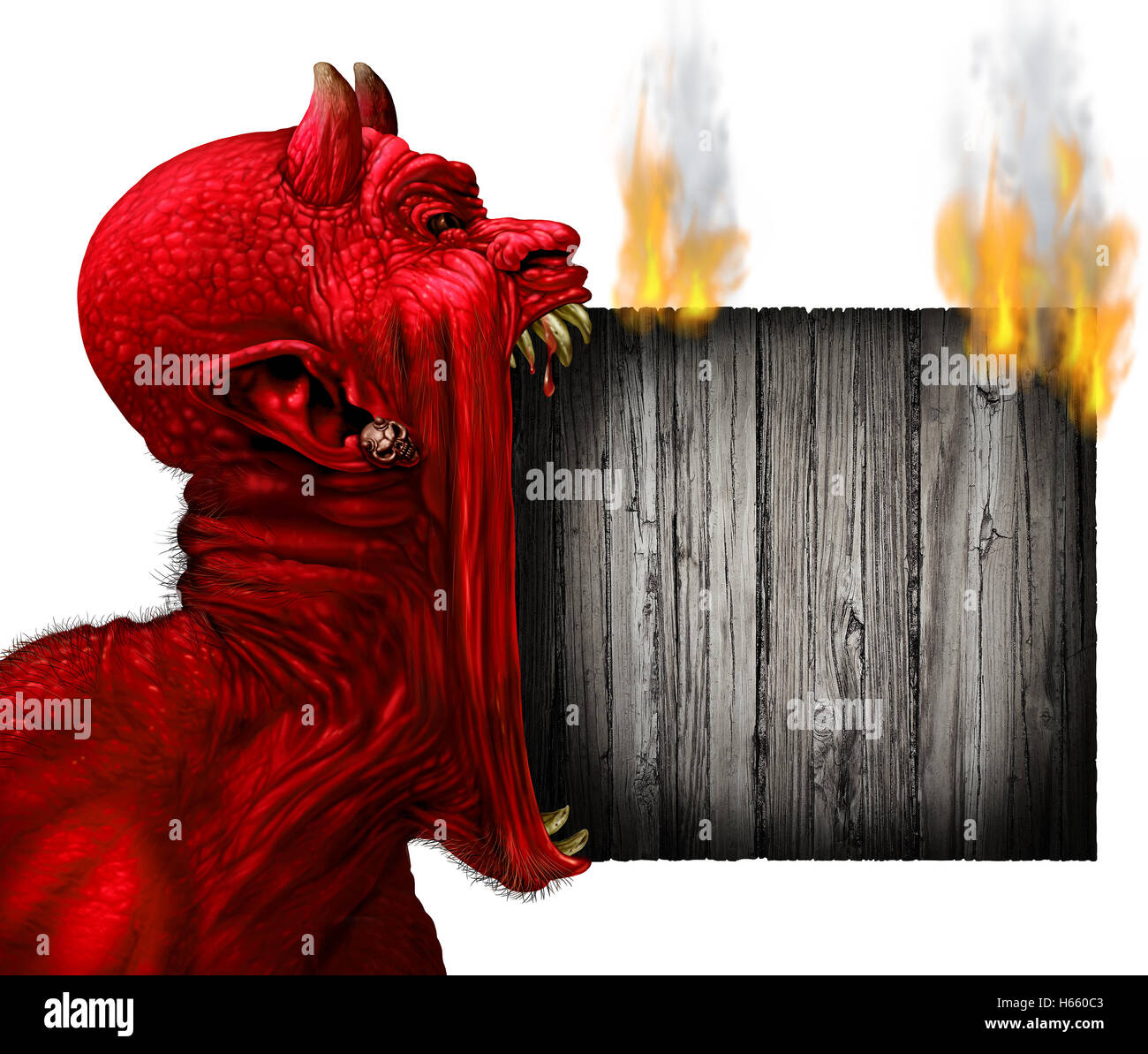 Tête de diable signer à la combustion de bois rustique comme un cri diable démon rouge ou monstre hurlant de crocs et dents Banque D'Images