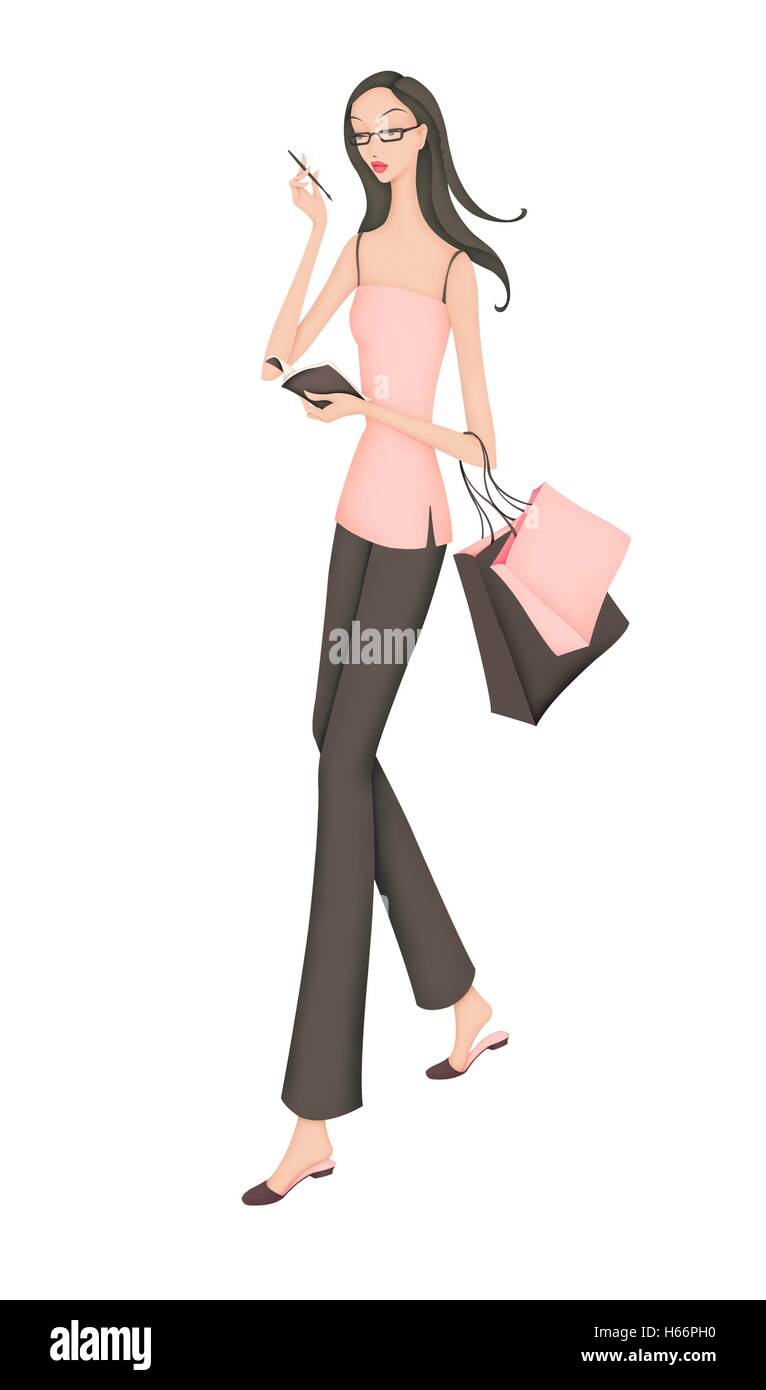 Femme marche avec ordinateur portable et sacs shopping Banque D'Images