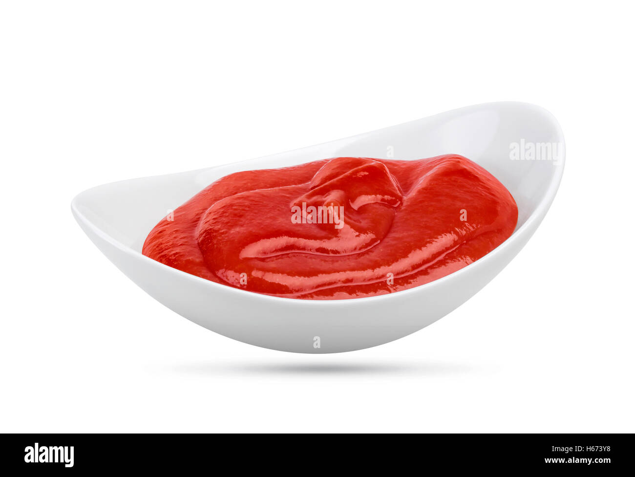 Le ketchup ou la sauce tomate bol isolated on white Banque D'Images