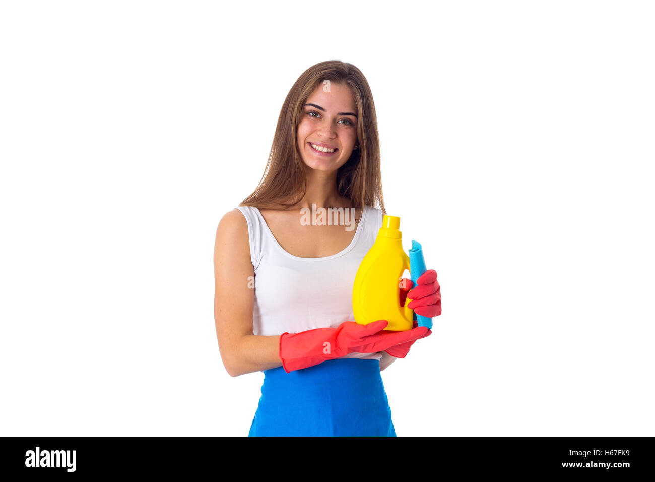 Woman holding duster et détergent Banque D'Images
