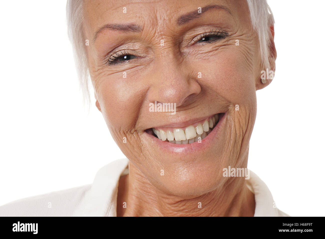 Close-up femme plus âgée avec sourire à pleines dents Banque D'Images