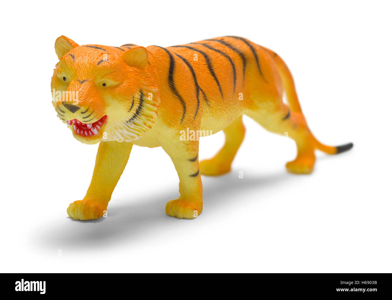 Tigre en plastique Toy isolé sur fond blanc. Banque D'Images