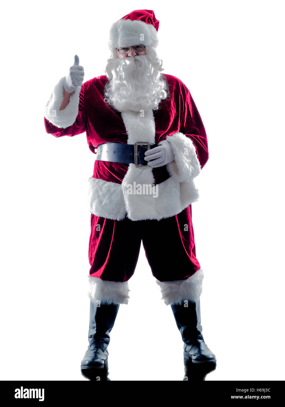 Un père noël homme Thumbs Up silhouette isolé sur fond blanc Banque D'Images