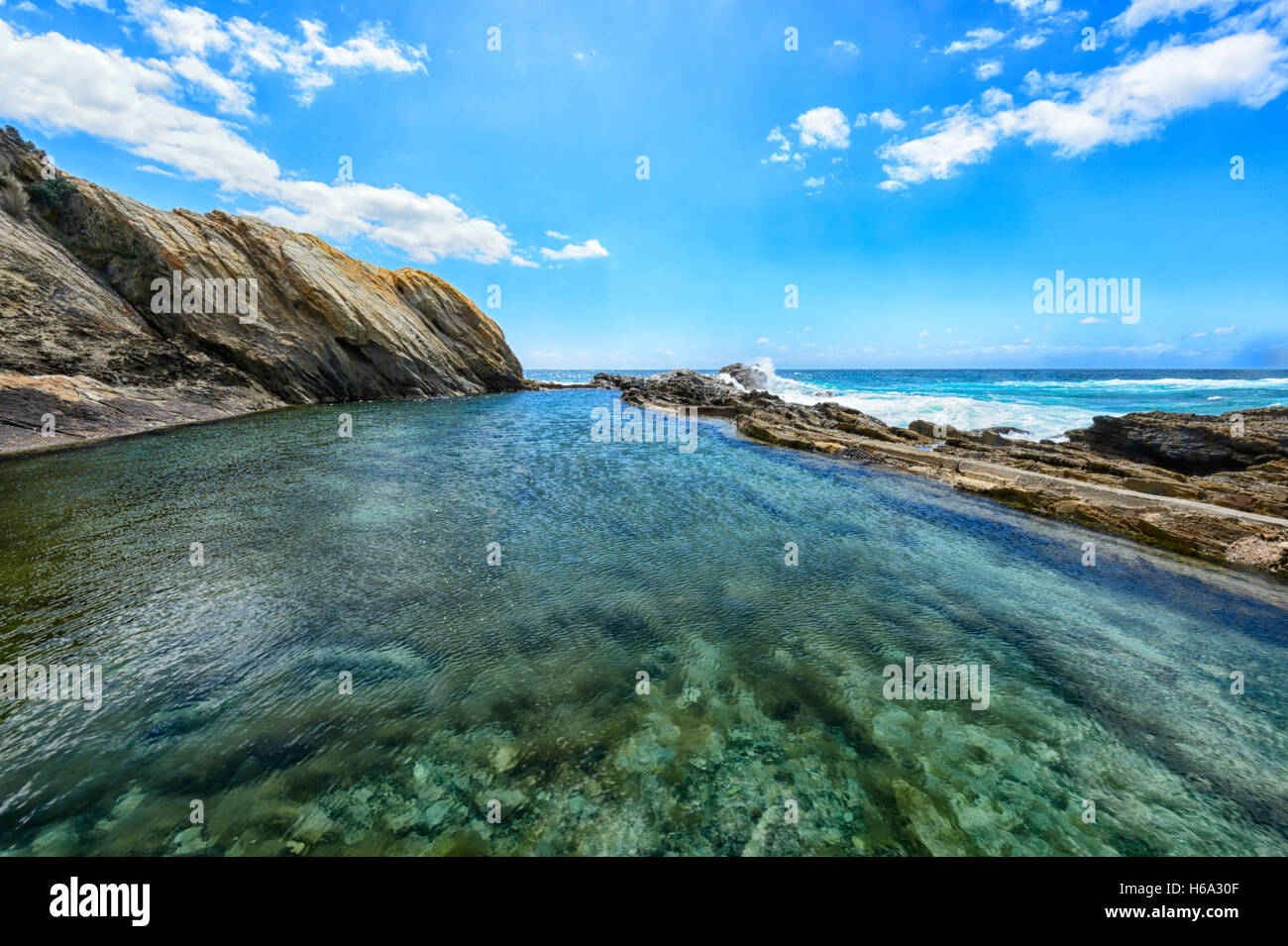 Blue Pool, une piscine de rock populaire, de Bermagui Sapphire Coast, Côte Sud, New South Wales, NSW, Australie Banque D'Images