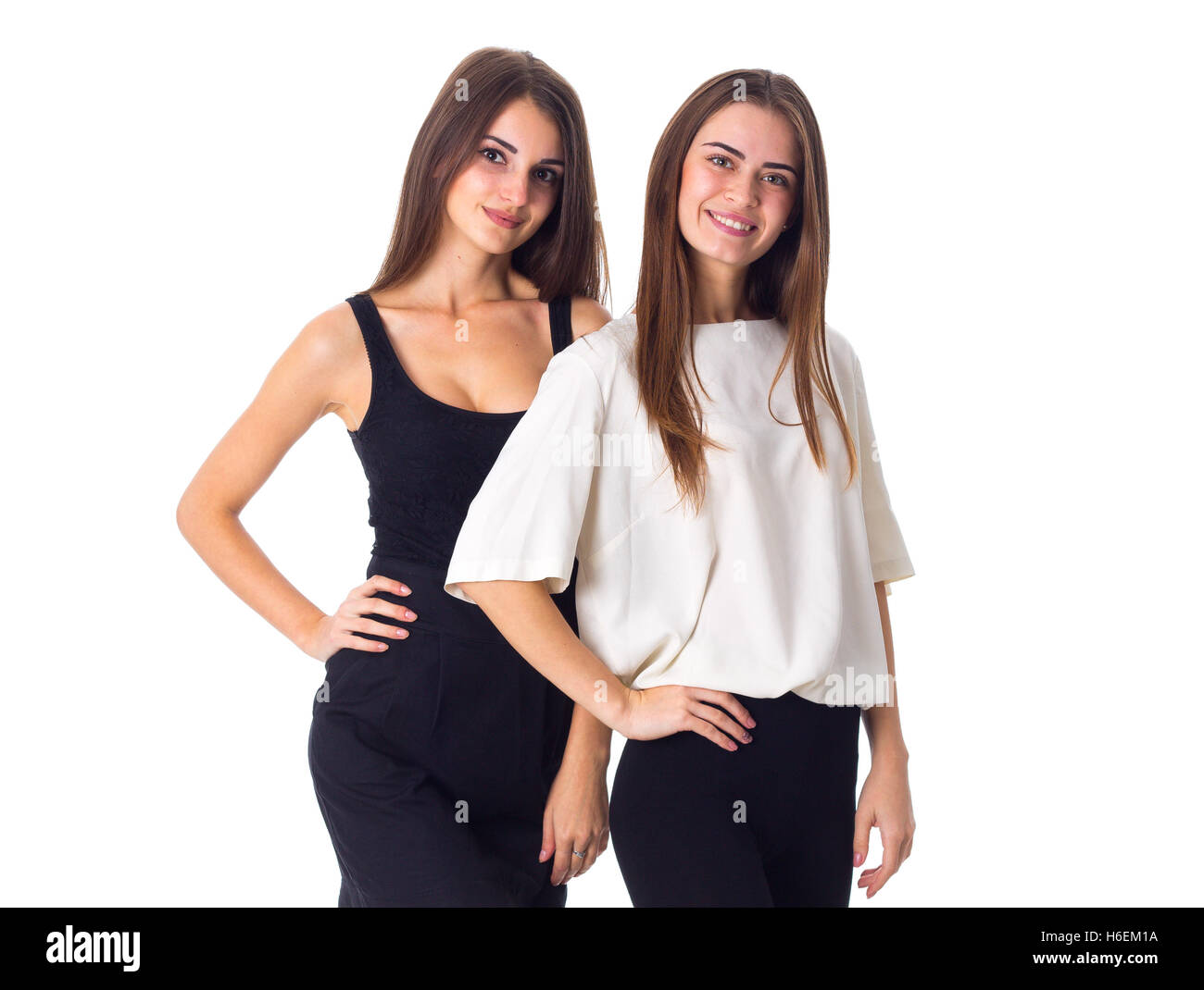 Deux jeunes woman standing and smiling Banque D'Images