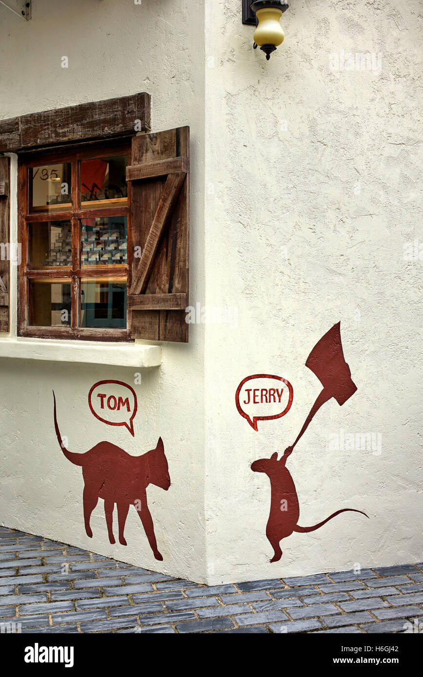 Mur art graffiti des personnages de dessin animé Tom et Jerry. Banque D'Images