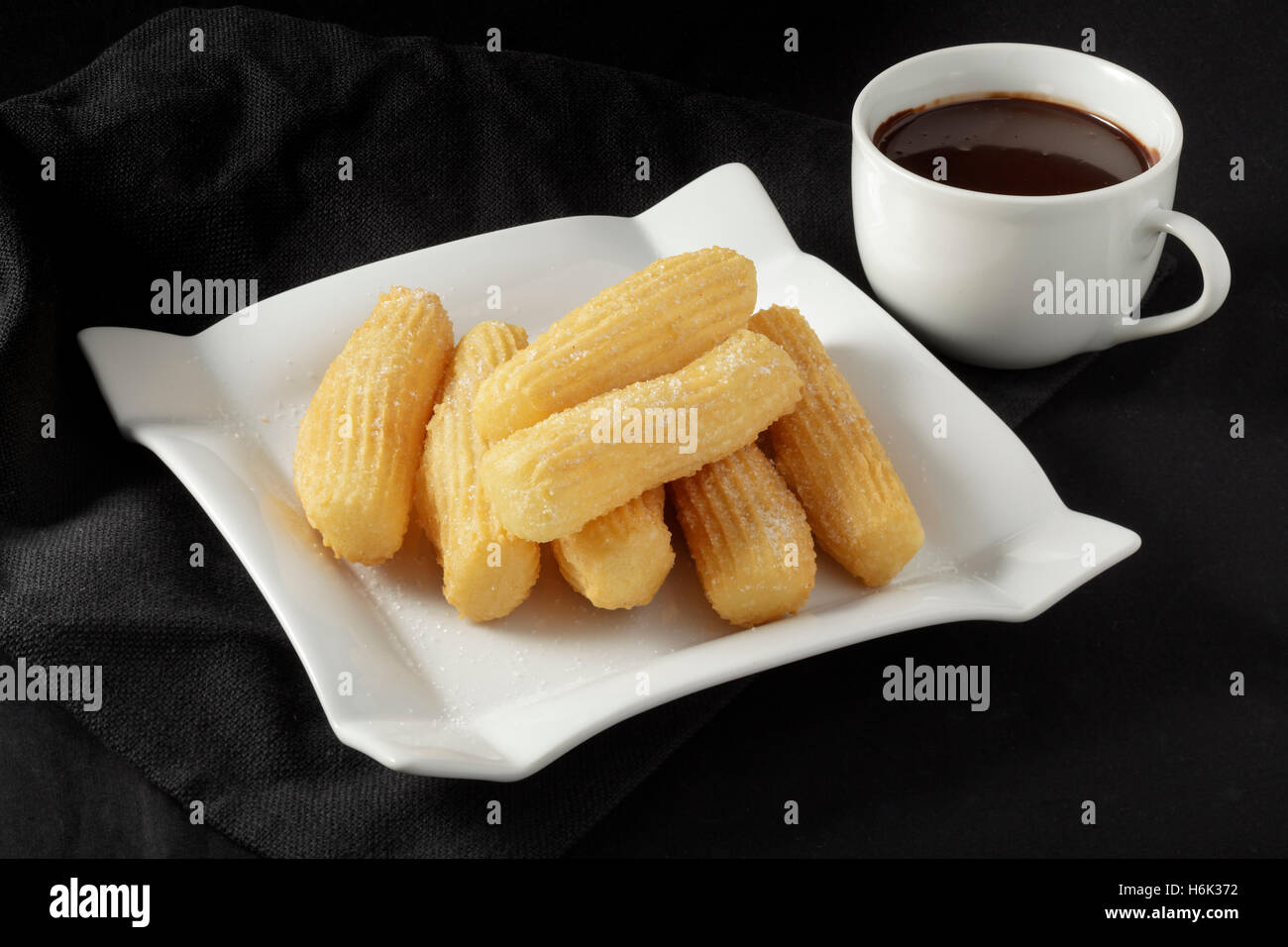 Churros et chocolat chaud Banque D'Images