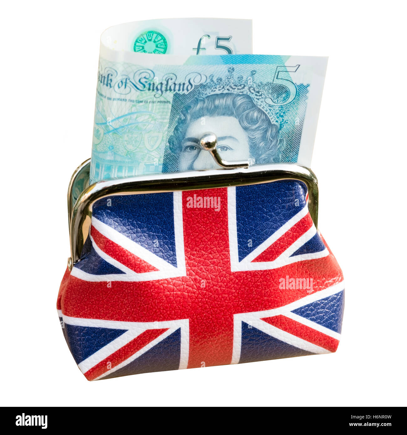 Union jack bourse d'argent avec cinq livres sterling note nouvelle, au Royaume-Uni. Découper ou isolé sur un fond blanc. Banque D'Images