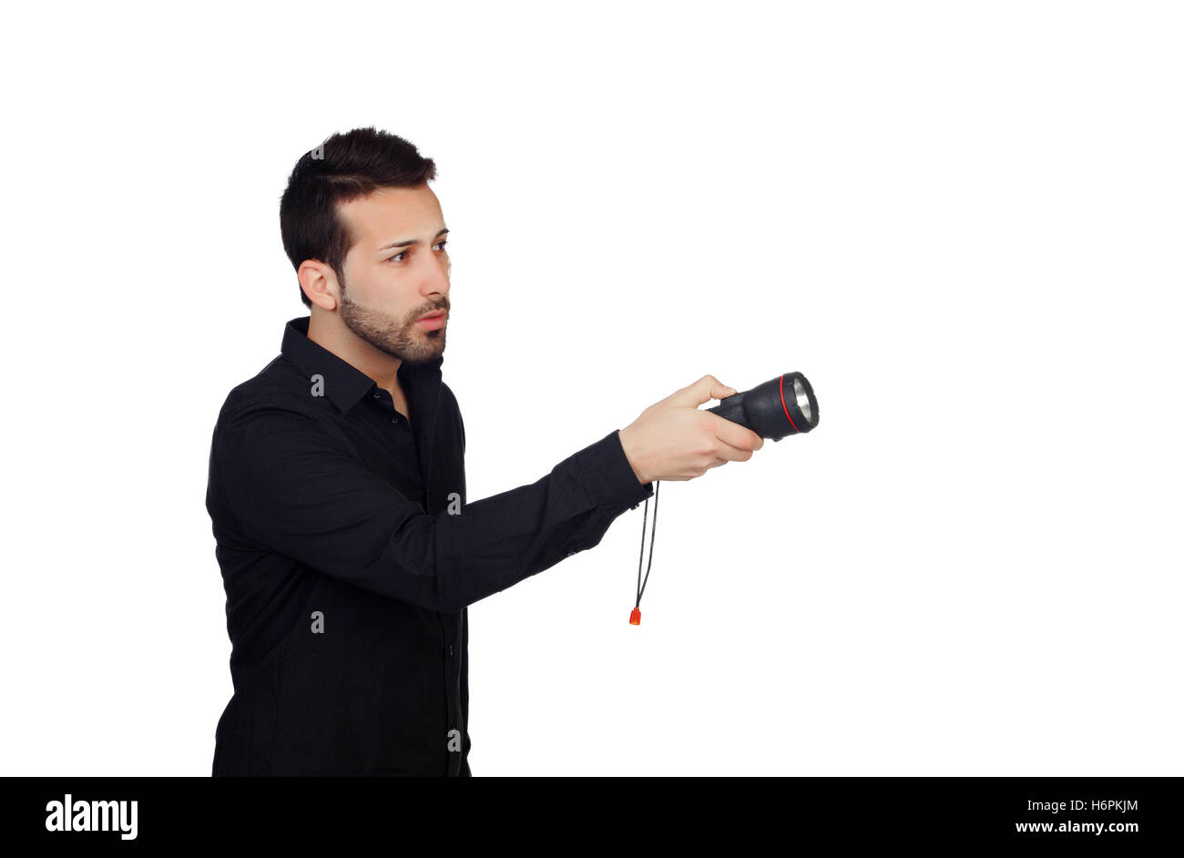 Beaux hommes en noir avec une lampe de poche à la recherche de quelque chose sur fond blanc Banque D'Images