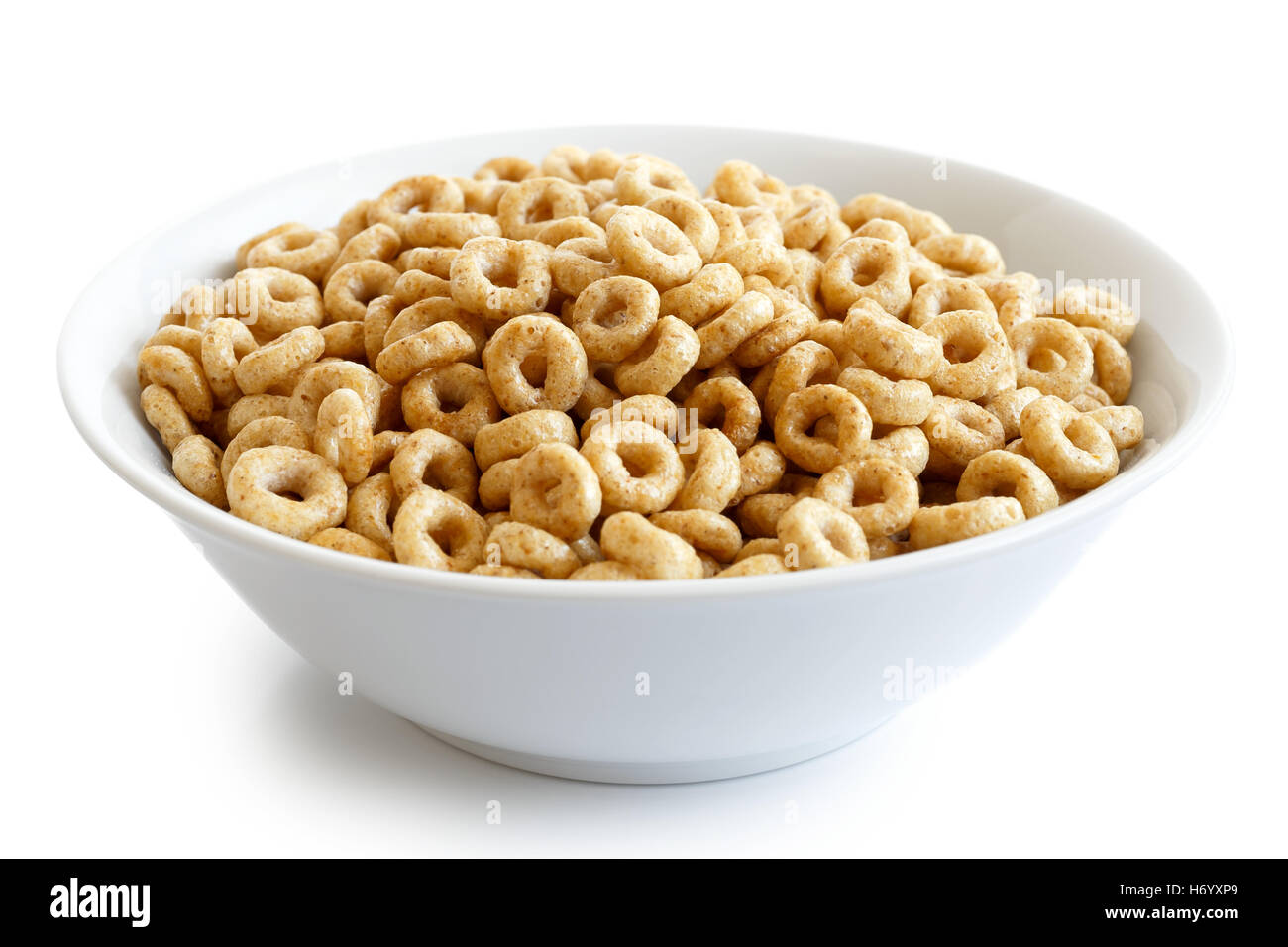 Bol de cheerios miel isolé sur blanc. Banque D'Images Bol de cheerios miel isolé sur blanc. Banque D'Images