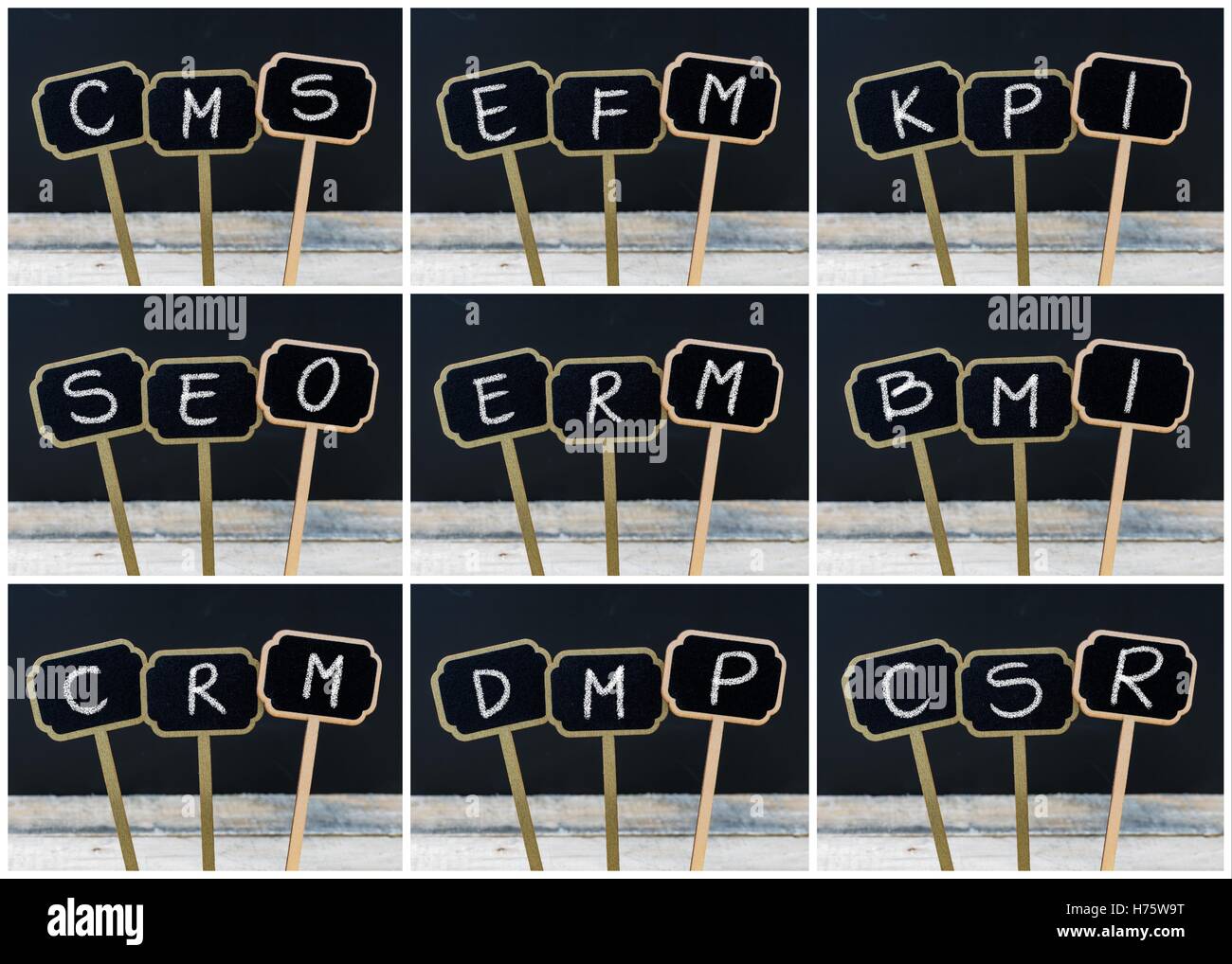 Collage Photo d'affaires acronymes écrit avec la craie sur tableau noir en bois mini étiquettes Banque D'Images