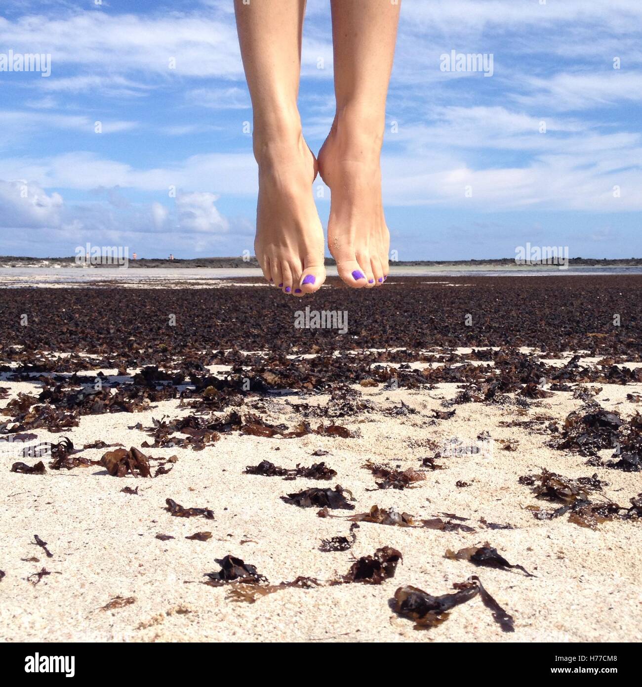 Pieds de femme l'air sur la plage Banque D'Images Pieds de femme l'air sur la plage Banque D'Images