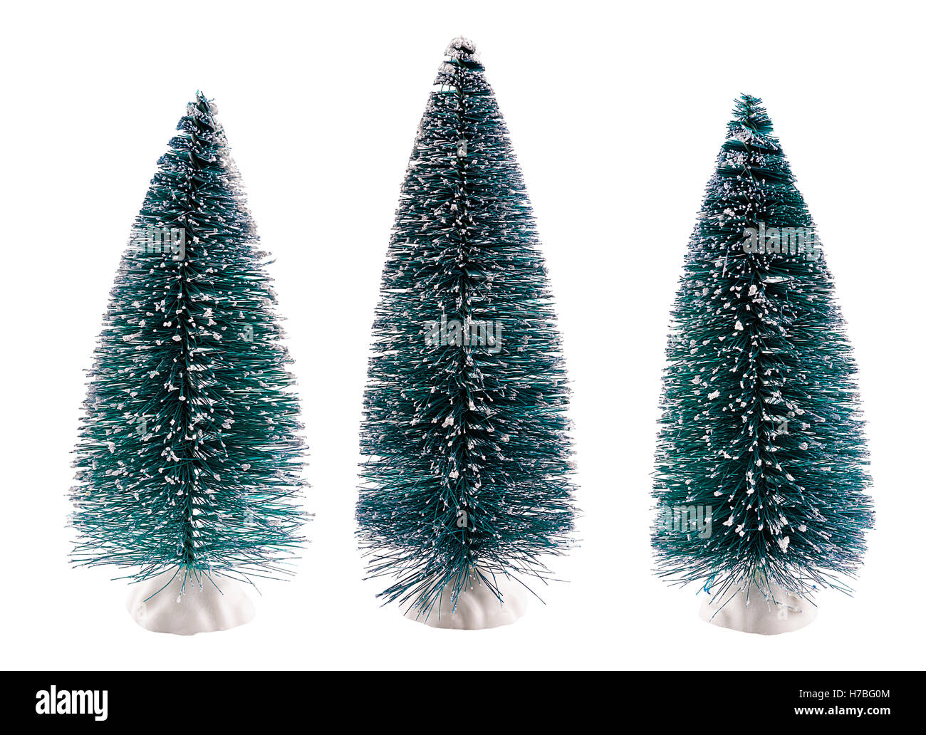 Ensemble d'arbres de Noël de décoration avec des branches isolées dans la neige Banque D'Images