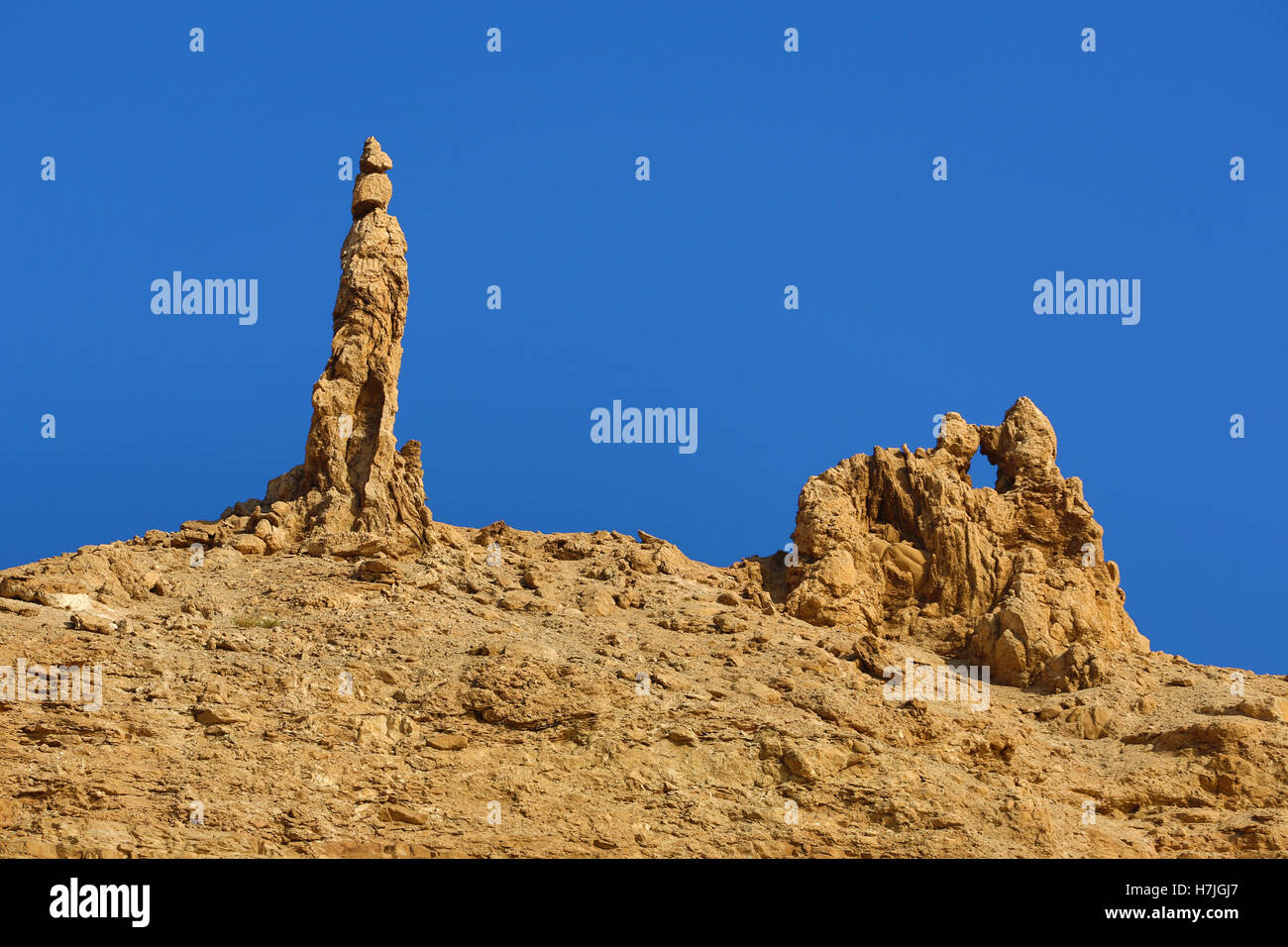 La femme de Lot statue de sel rock formation à côté de la Mer Morte, Jordanie Banque D'Images
