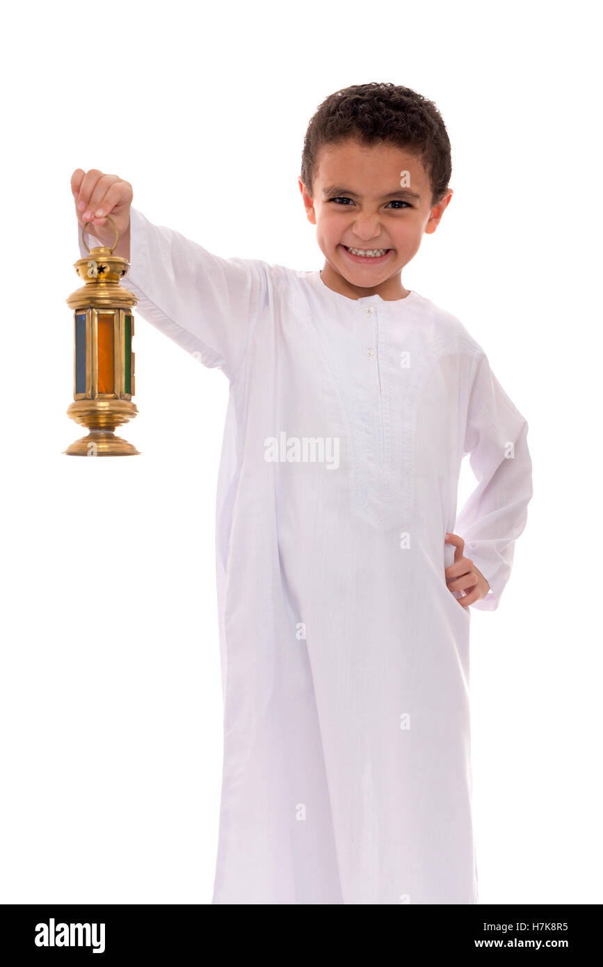 Petit garçon joyeux célébrant le Ramadan avec lanterne isolé sur fond blanc Banque D'Images