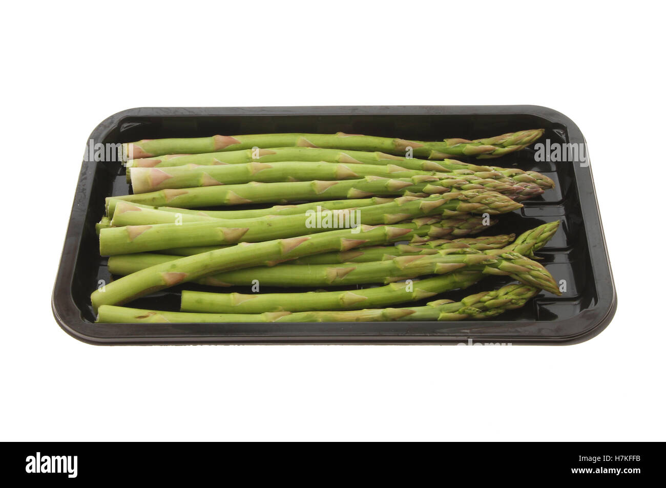 Les asperges en carton blanc contre isolés Banque D'Images