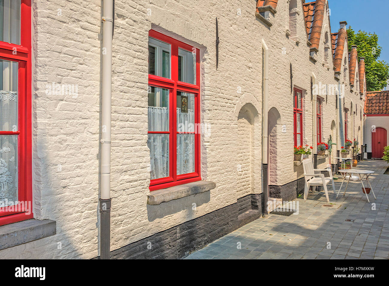 Construit en briques anciennes maisons d'AUMÔNE Bruges Belgique Banque D'Images