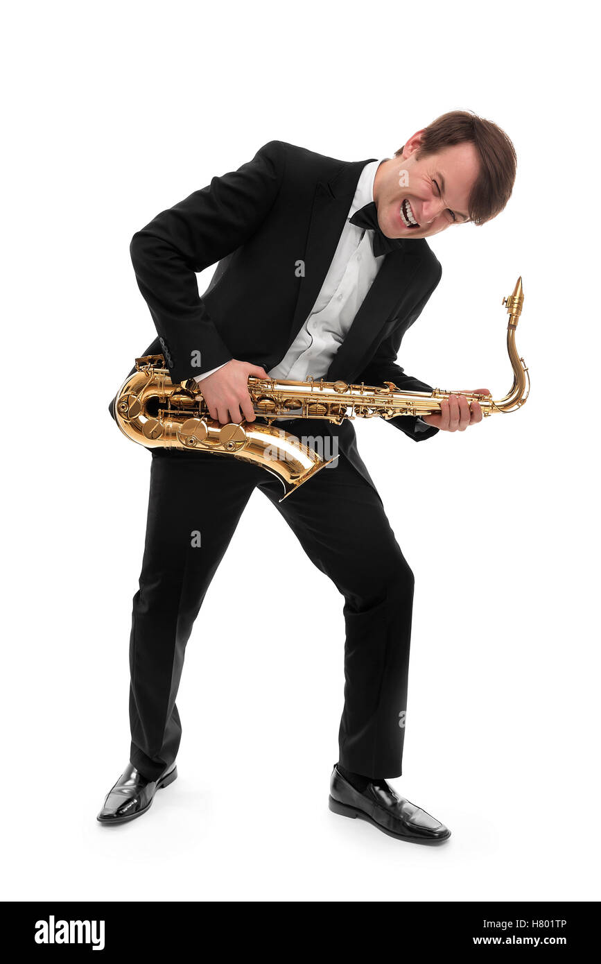 À jouer du saxophone saxophoniste hard rock avec un drôle de visage. Banque D'Images