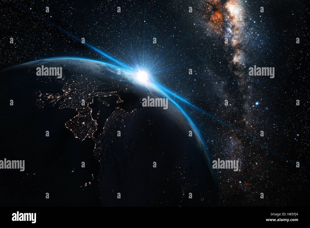 Blue Sunrise sur terre vue de l'espace. Avec des stars de fond. Banque D'Images