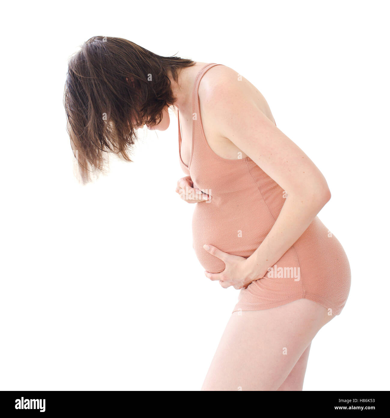 Silhouette de femme enceinte dans la région de vest après la douche Banque D'Images