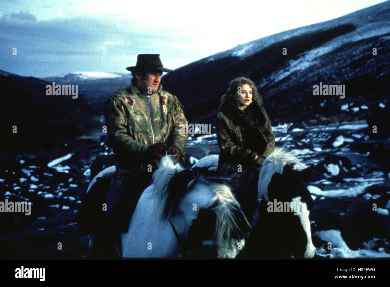 Dans l'Ouest, (DANS L'OUEST), GB-USA 1993, Regie : Mike Newell, COLM MEANEY, Ellen Barkin, Ausdruck : Reiten, Pferde Banque D'Images