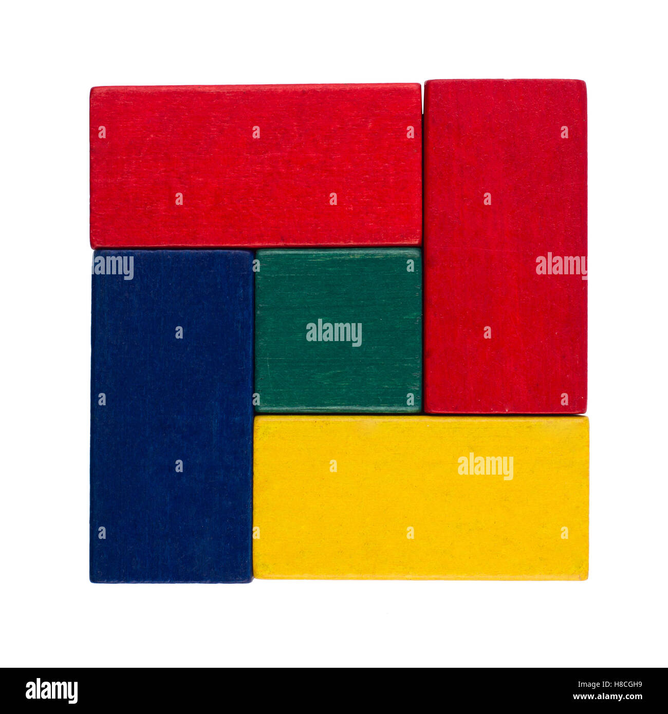 Square abstract composition couleur bois avec blocs de construction jouets isolated on white Banque D'Images
