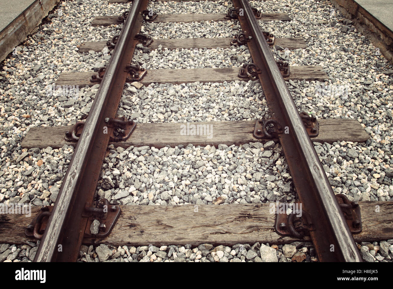 Vintage couleur de photo dans le vieux chemin de fer pour le transport. Banque D'Images