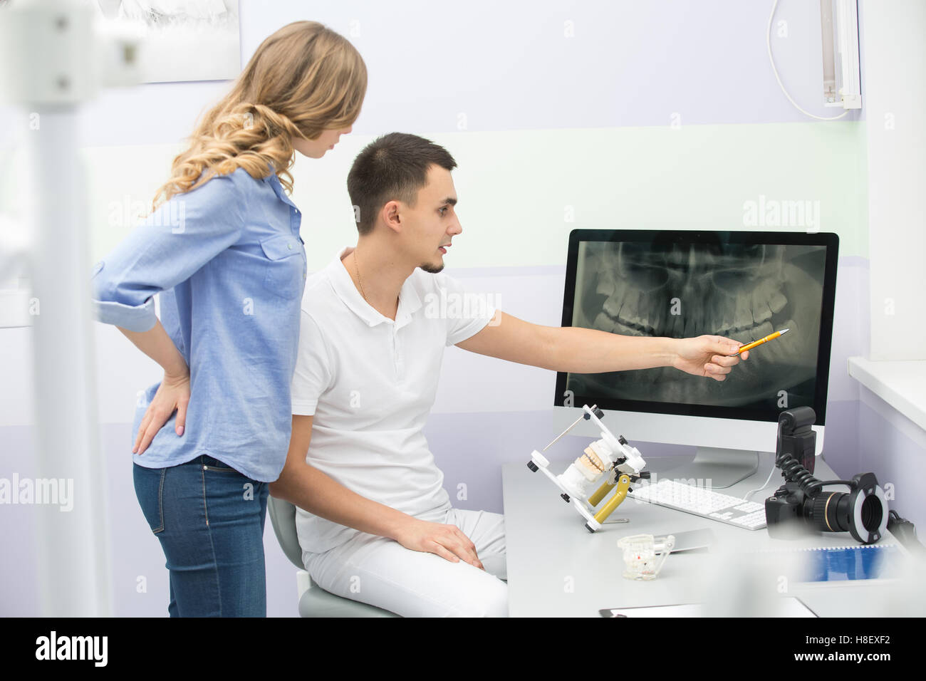 Dentiste et le patient Banque D'Images