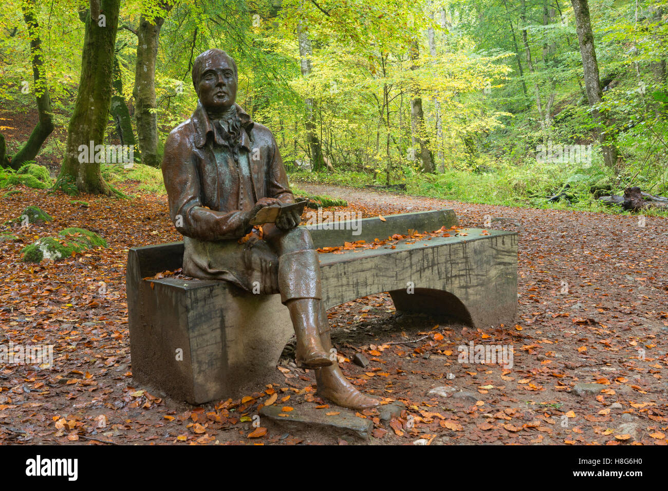 Une statue de Robert Burns se trouve dans le de Birks Aberfeldy le long du Moness brûler dans le Perthshire, en Écosse. Banque D'Images