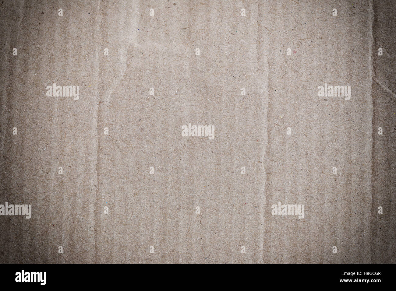 La texture de la boîte de carton ou de papier brun dans un style vintage pour la conception historique. Banque D'Images