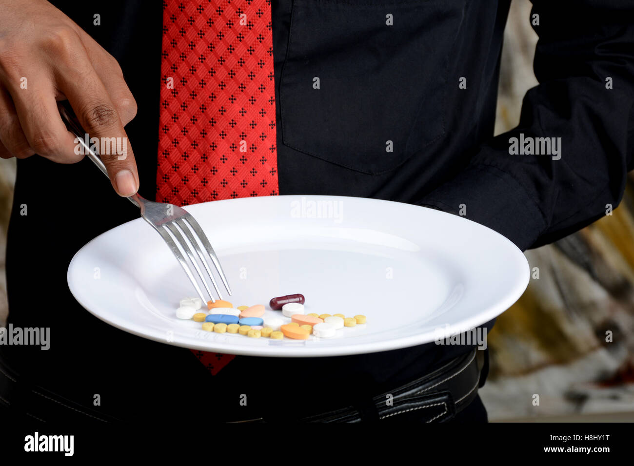 Concept de saine alimentation professionnelle - prendre des pilules. Banque D'Images