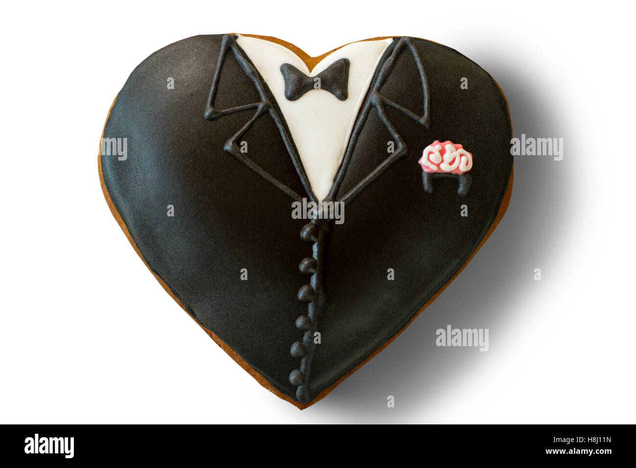 Tuxedo en forme de coeur cookie. Banque D'Images