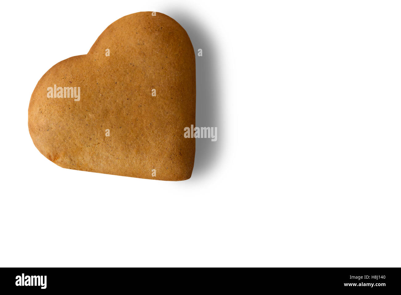 Cookies en forme de coeur brun. Banque D'Images