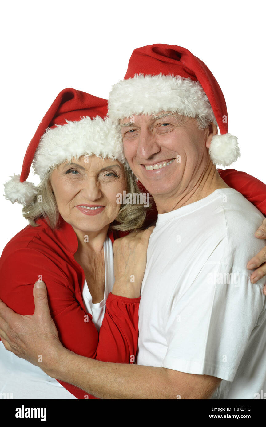 Senior couple in Santa hats Banque D'Images