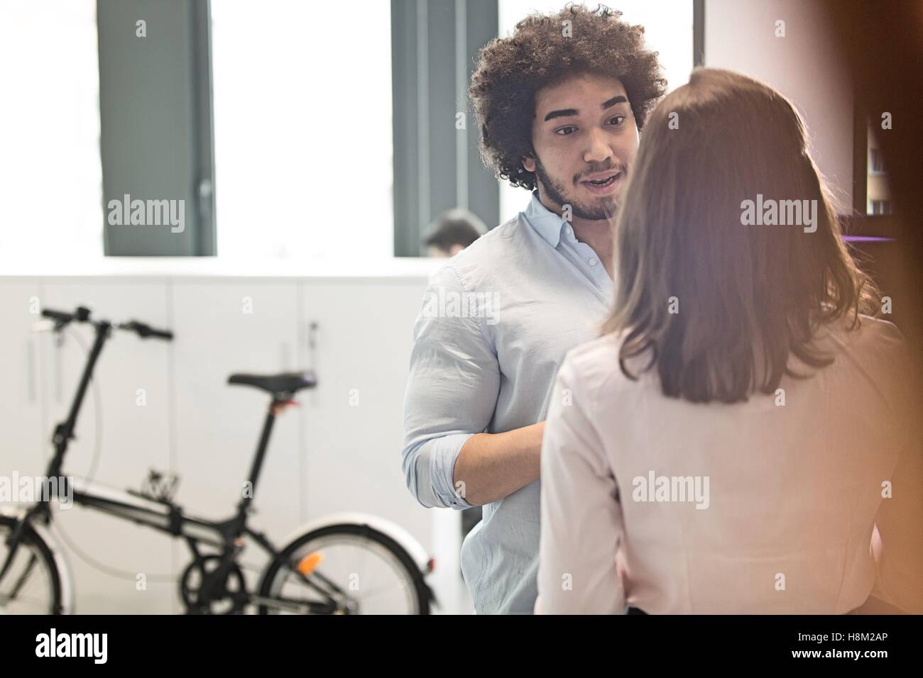 Young Woman with female in office Banque D'Images