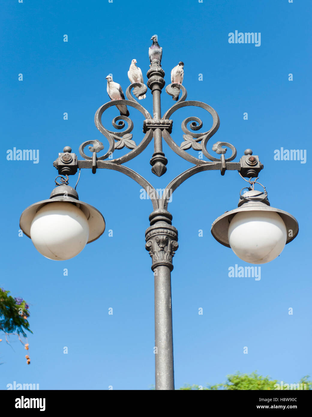 Lampadaire avec décoration à Séville, Espagne Banque D'Images