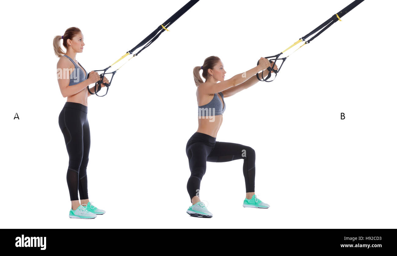 Athletic woman performing un exercice fonctionnel avec câble de suspension. Banque D'Images