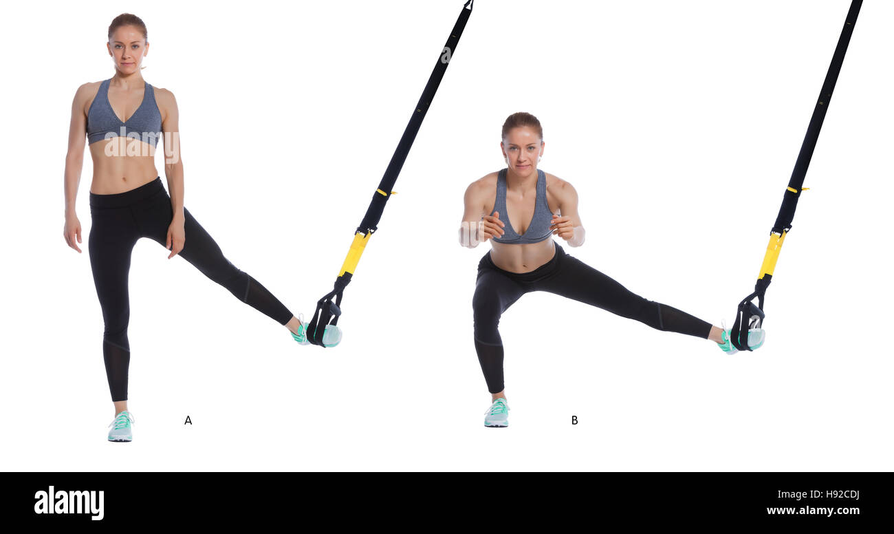 Athletic woman performing un exercice fonctionnel avec câble de suspension. Banque D'Images