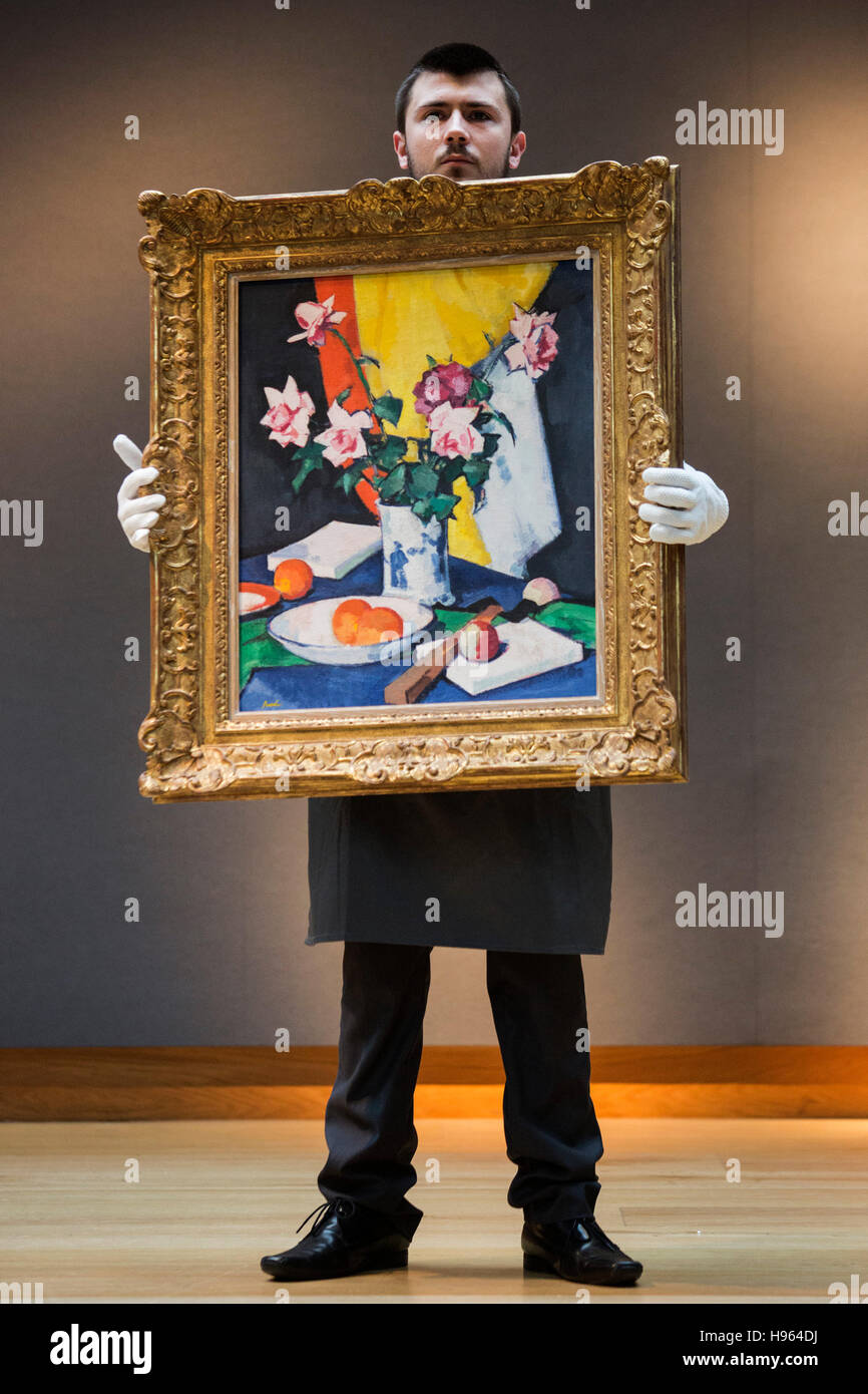 Londres, Royaume-Uni. 18 novembre 2016. Sur la photo : roses rouges et roses, oranges et le ventilateur par Samuel John Peploe, est. GBP 600,000-1,000 000. Christie's présente les points saillants de leurs prochaines Modern British & Irish Art evening sale le 23 novembre 2016. Banque D'Images